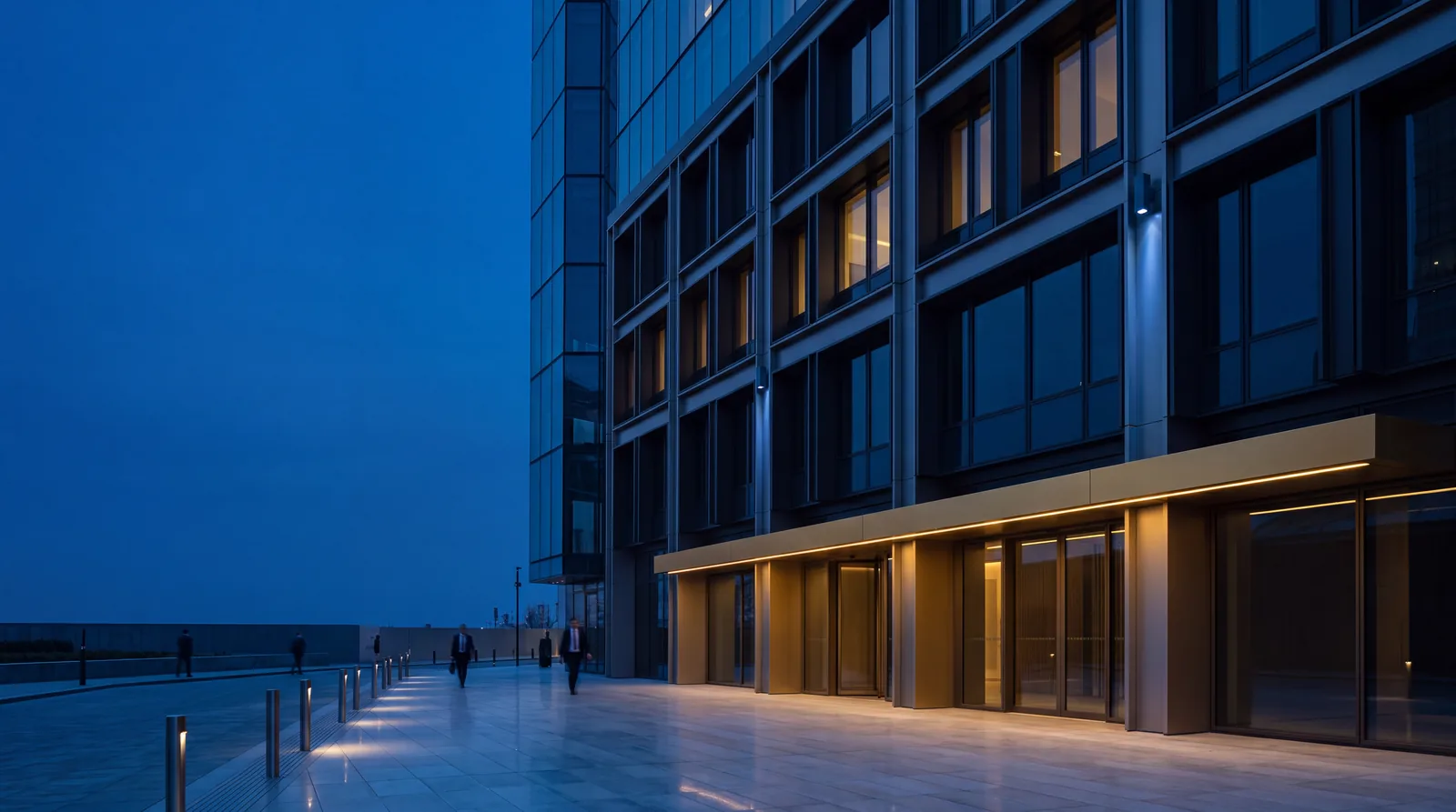 Financial-district technology building at blue hour